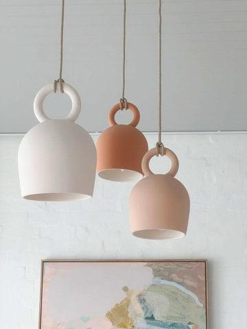 Ceramic pendant lighting family featuring multiple shapes and sizes.