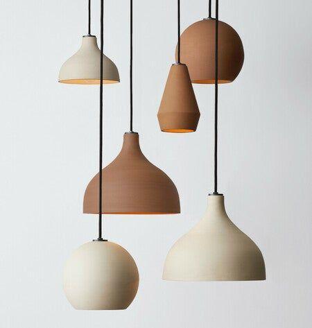 Ceramic pendant lighting family featuring multiple shapes and sizes.