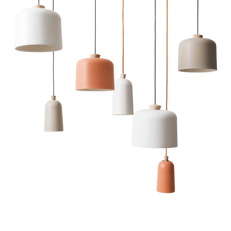 Ceramic pendant lighting family featuring multiple shapes and sizes.