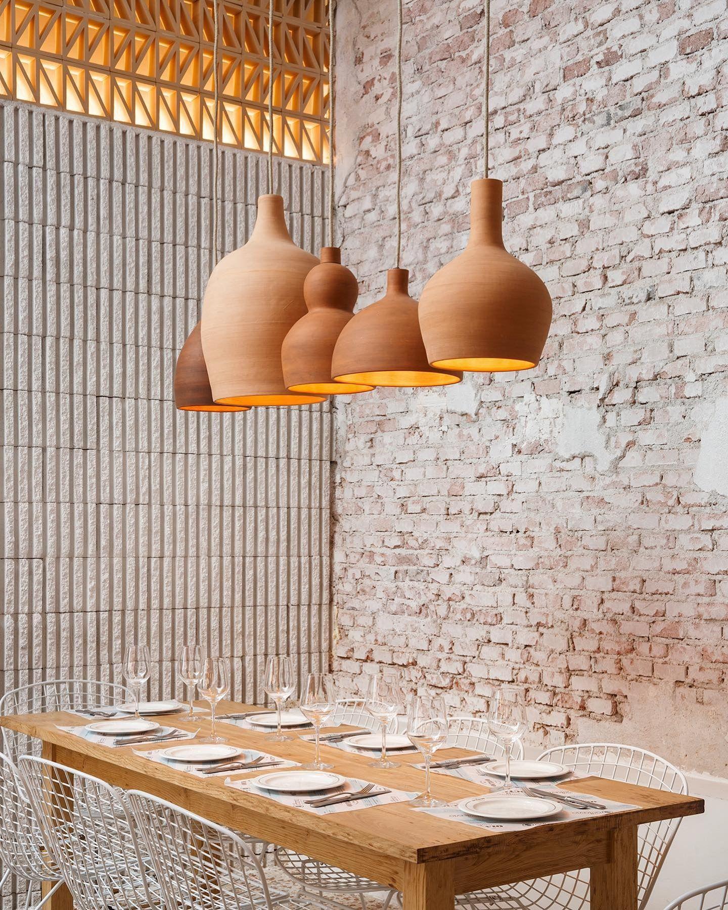 Ceramic pendant lighting installed in a contemporary residential interior.