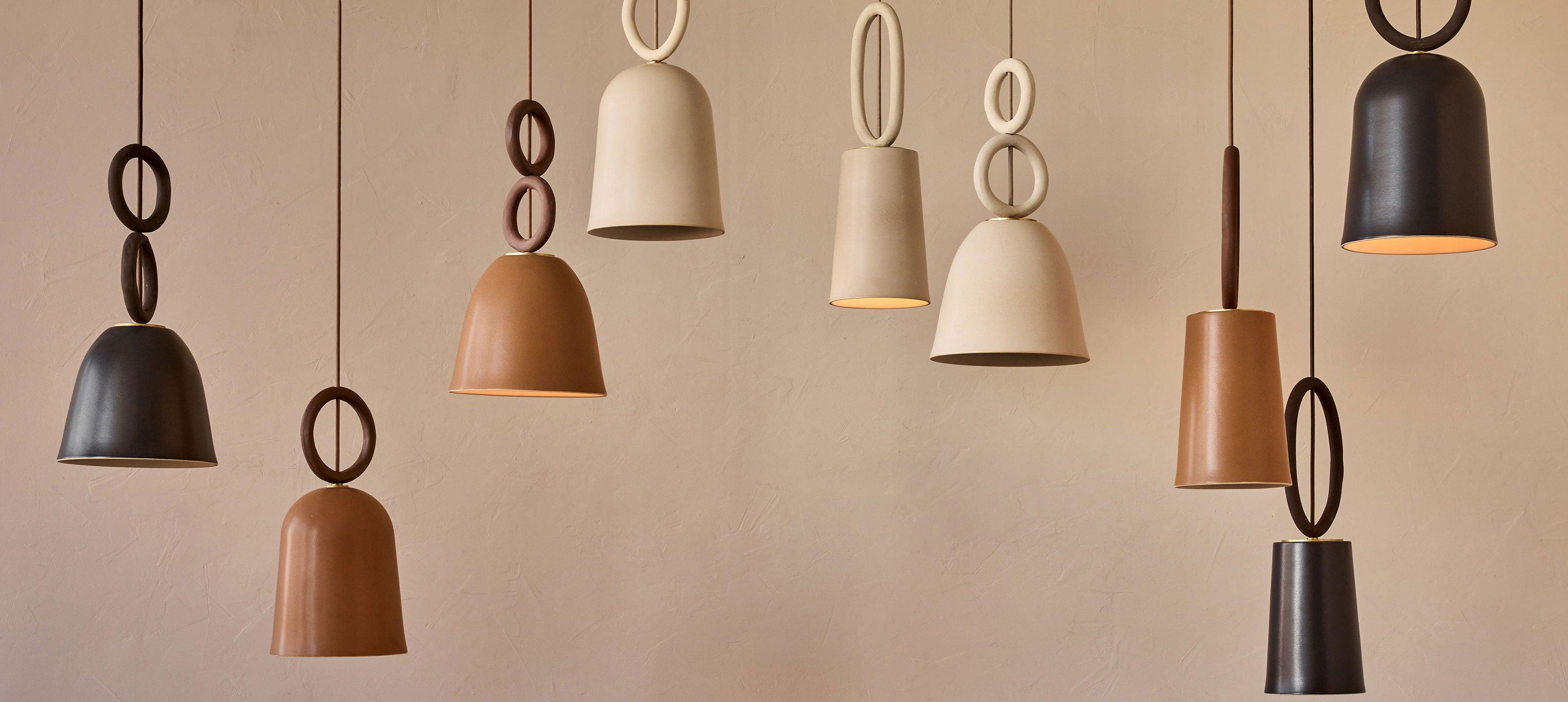 Ceramic pendant lighting family featuring multiple shapes and sizes.