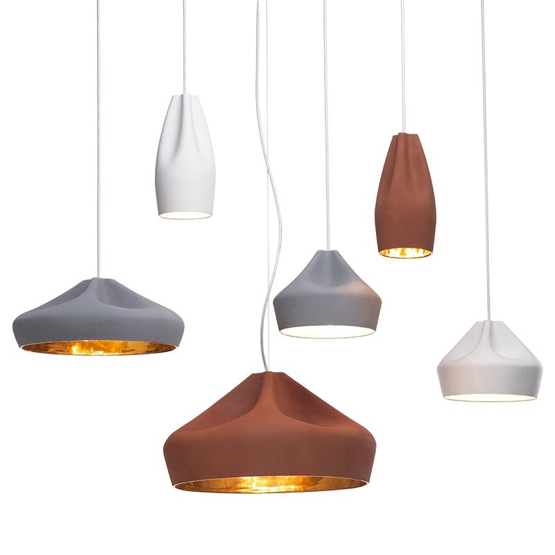 Ceramic pendant lighting family featuring multiple shapes and sizes.