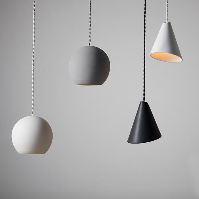 Ceramic pendant lighting family featuring multiple shapes and sizes.