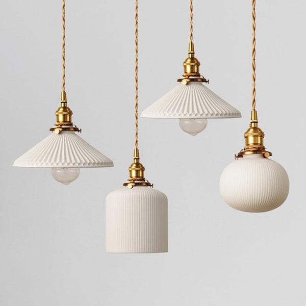 Ceramic pendant lighting family featuring multiple shapes and sizes.