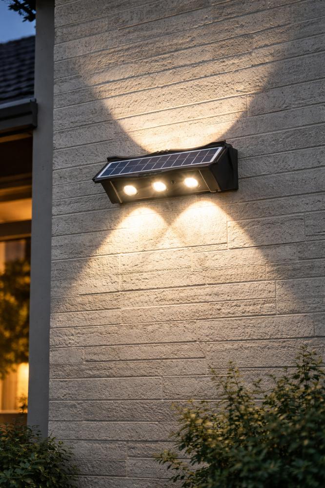 Solar LED wall lights installed on a contemporary residential façade.