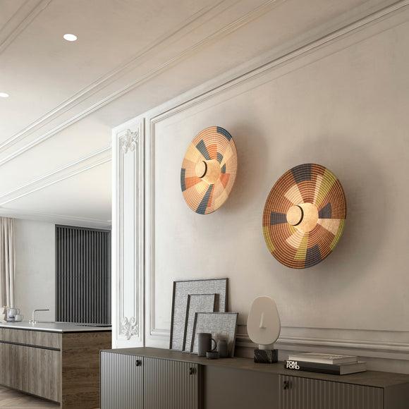 Woven wall lamp installed in a luxury resort interior with contemporary natural architecture.