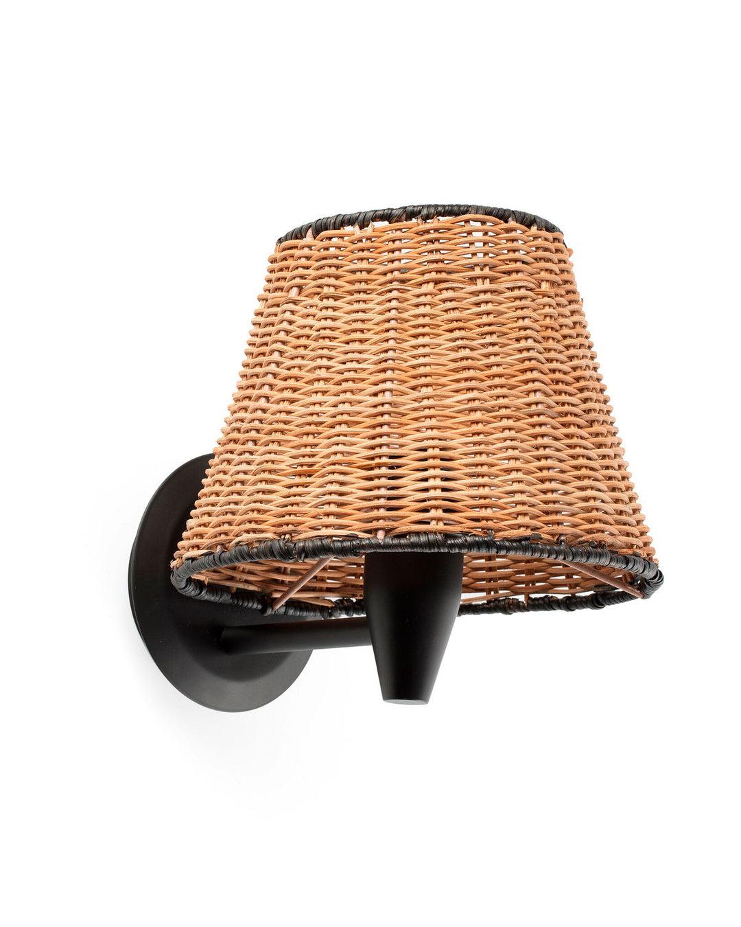 Handwoven rattan wall lamp photographed on a clean white studio background.