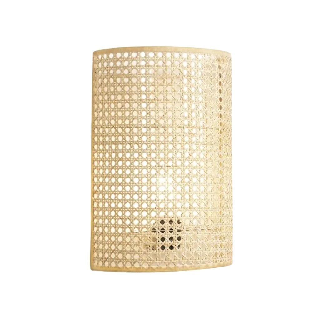 Handwoven rattan wall lamp photographed on a clean white studio background.
