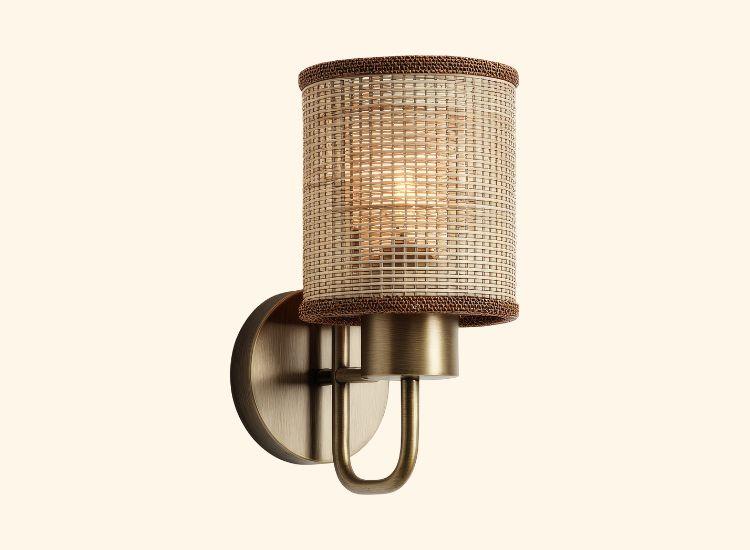 Front view of a woven wall lamp crafted from natural fibers.