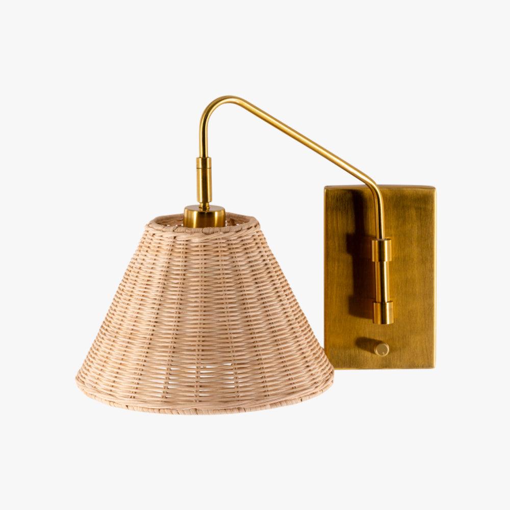 Handwoven rattan wall lamp photographed on a clean white studio background.