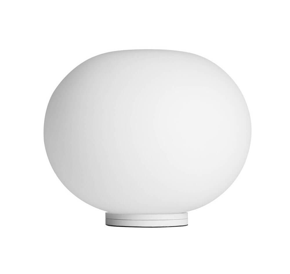 Globe table lamp photographed on a clean white background showcasing its opal spherical diffuser and premium base.