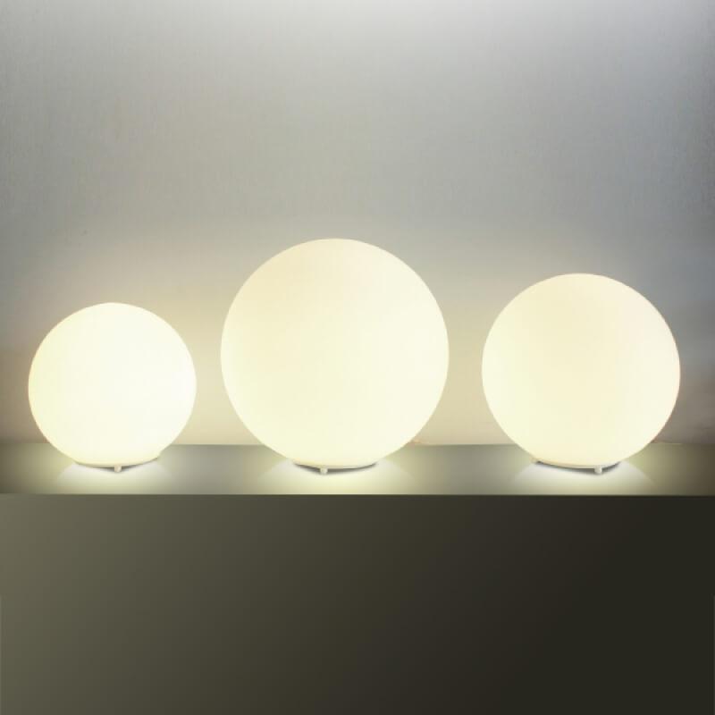 Collection of globe table lamps featuring opal glass diffusers and premium decorative finishes.