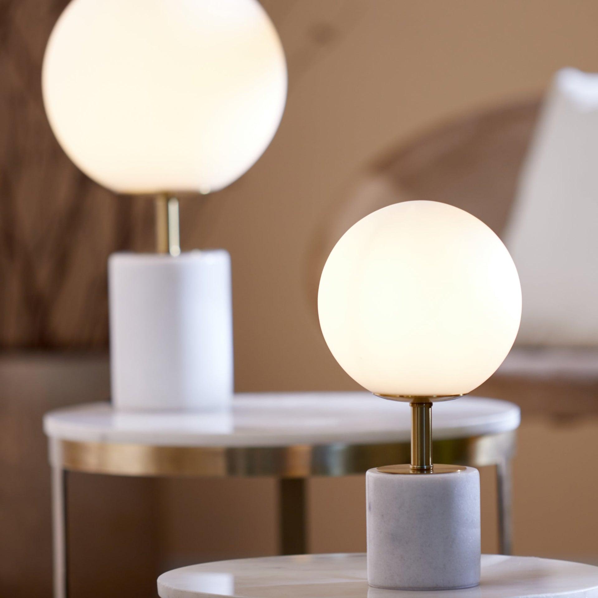 Collection of globe table lamps featuring opal glass diffusers and premium decorative finishes.