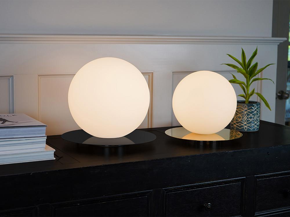 Collection of globe table lamps featuring opal glass diffusers and premium decorative finishes.