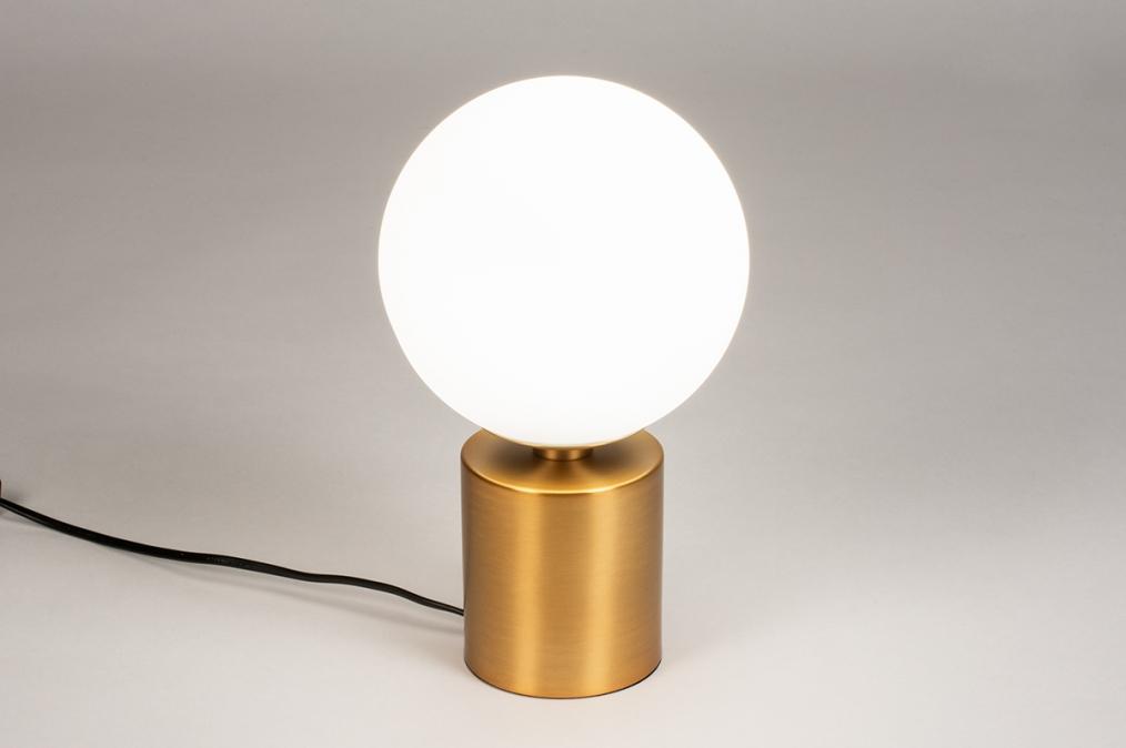 Front view of a globe table lamp highlighting the elegant spherical form and refined architectural design.