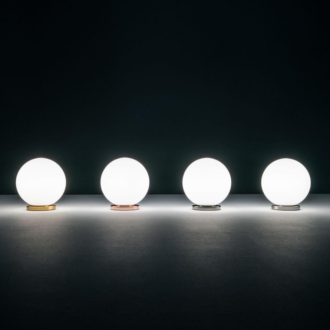 Collection of globe table lamps featuring opal glass diffusers and premium decorative finishes.