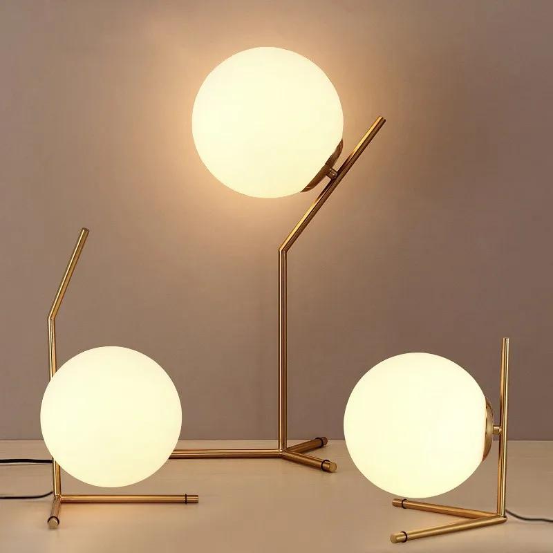 Collection of globe table lamps featuring opal glass diffusers and premium decorative finishes.