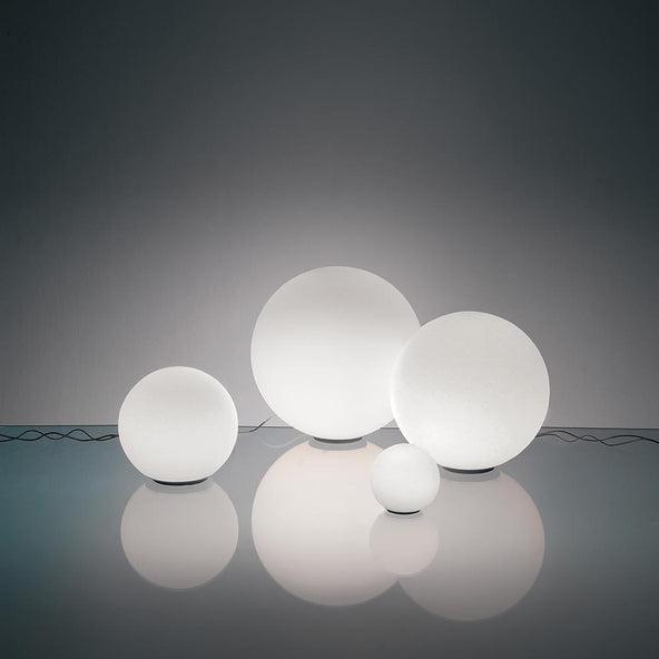 Collection of globe table lamps featuring opal glass diffusers and premium decorative finishes.
