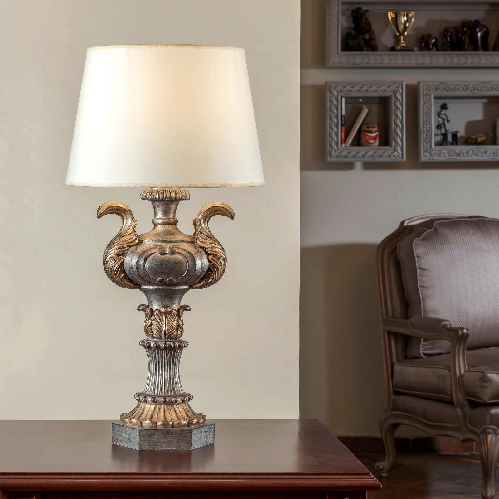 Classic table lamp placed in a luxury hotel lounge creating warm ambient lighting and timeless sophistication.