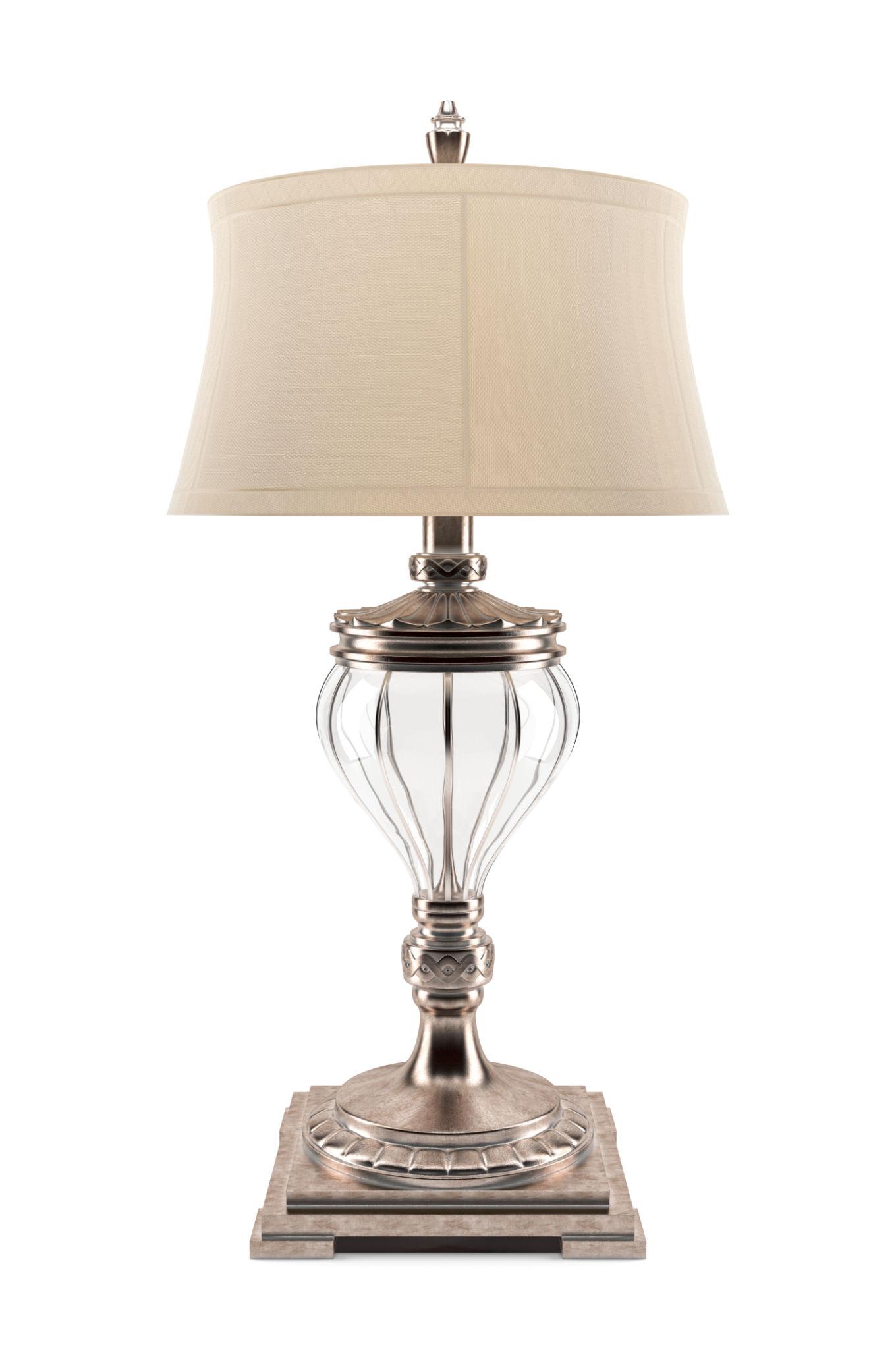 Classic table lamp photographed on a clean white background showcasing traditional craftsmanship and elegant detailing.