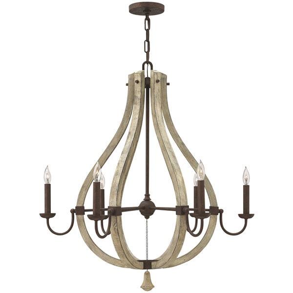 Rustic chandelier featuring wood and wrought iron photographed on a clean white studio background.