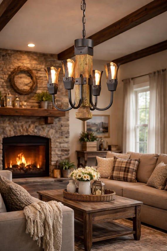 Rustic chandelier installed in a luxury mountain lodge with warm architectural interiors.