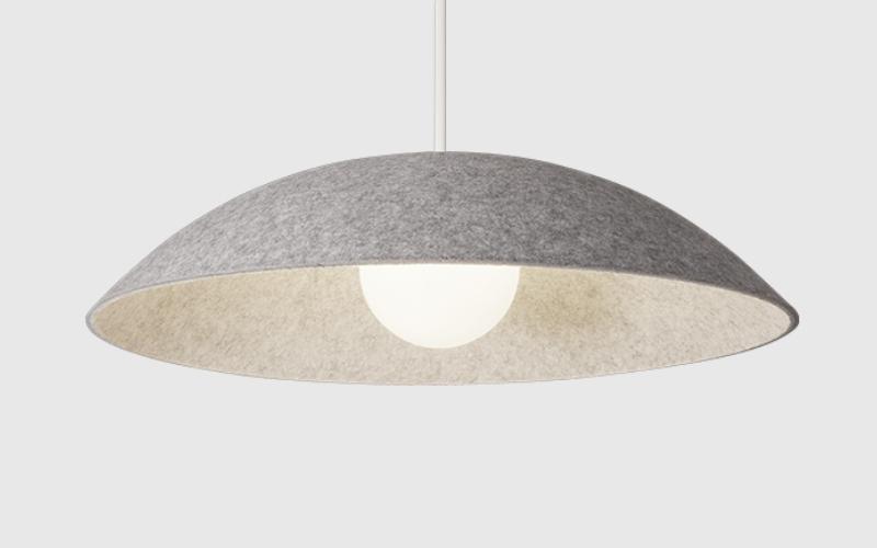 Front view of an acoustic pendant light for contemporary architectural interiors.