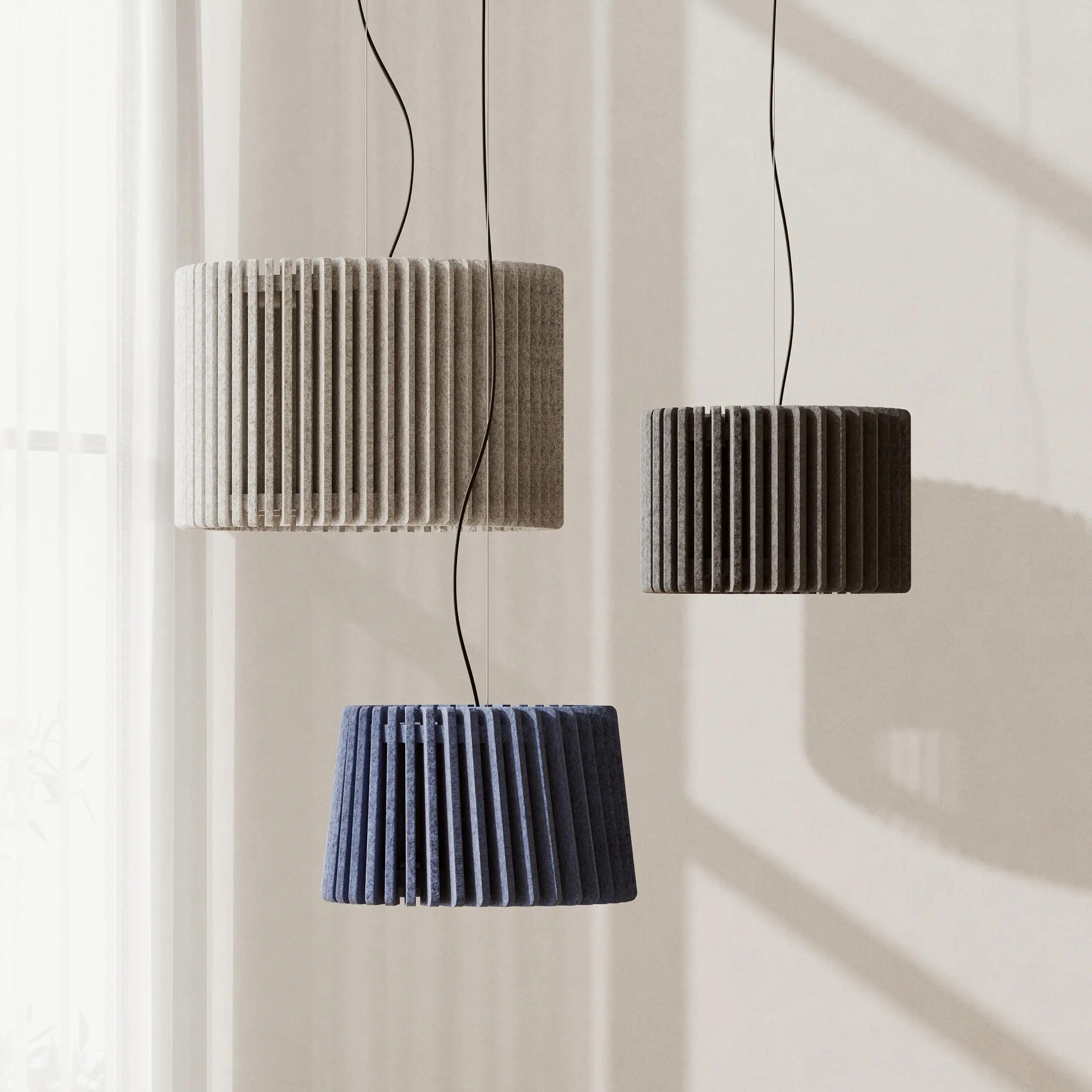Acoustic pendant lighting family featuring multiple acoustic panel configurations.