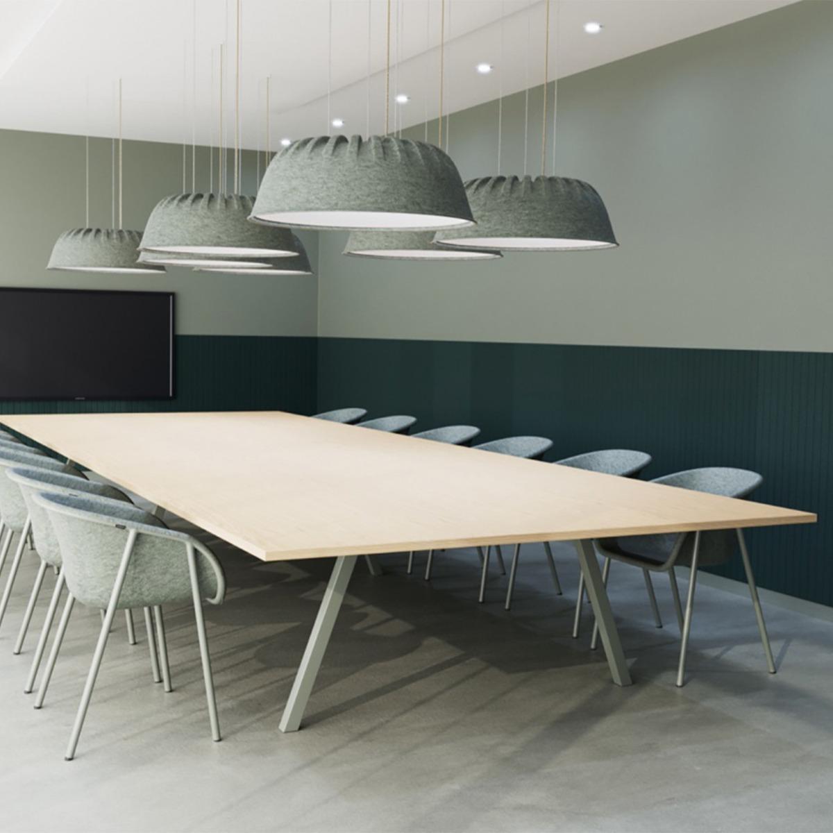 Acoustic pendant lighting installed in a modern office workspace.