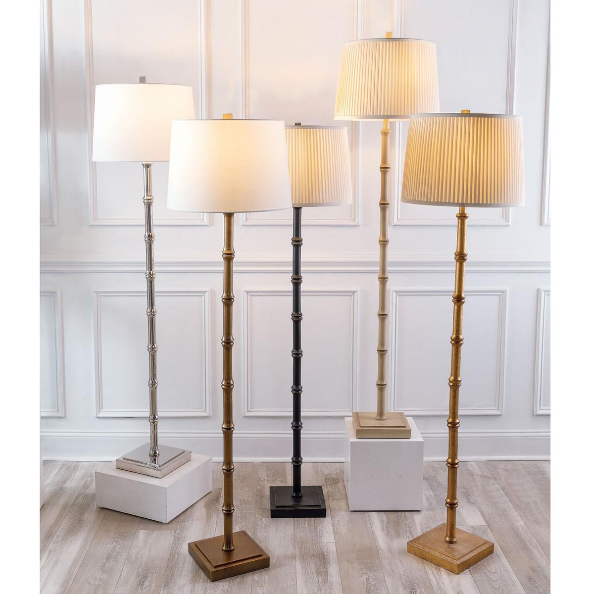Collection of classic floor lamps featuring brass, ceramic and fabric shade combinations for elegant residential and hospitality interiors.