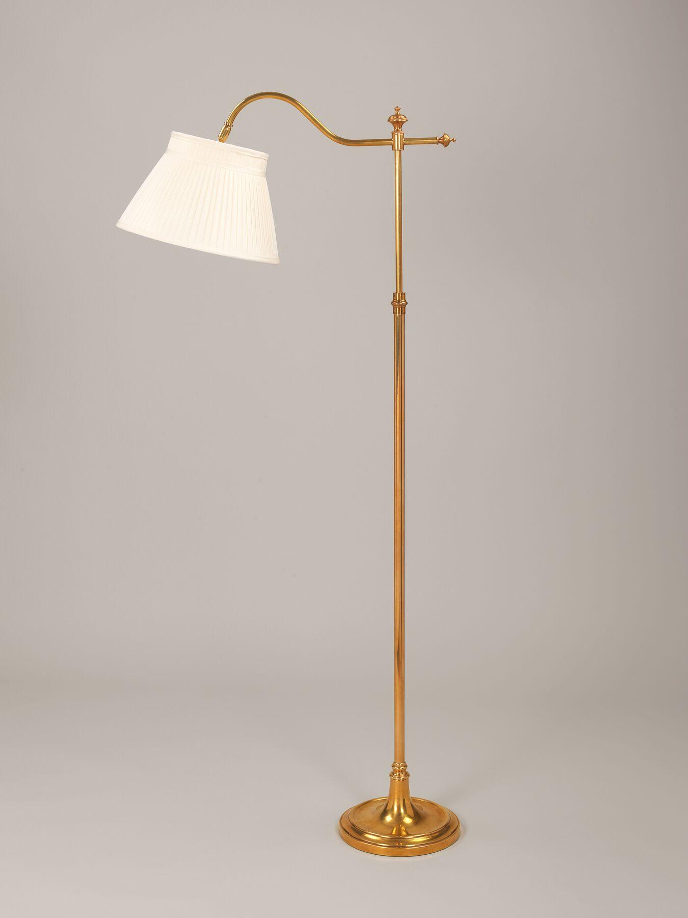Front view of a classic floor lamp highlighting refined proportions and timeless architectural design.