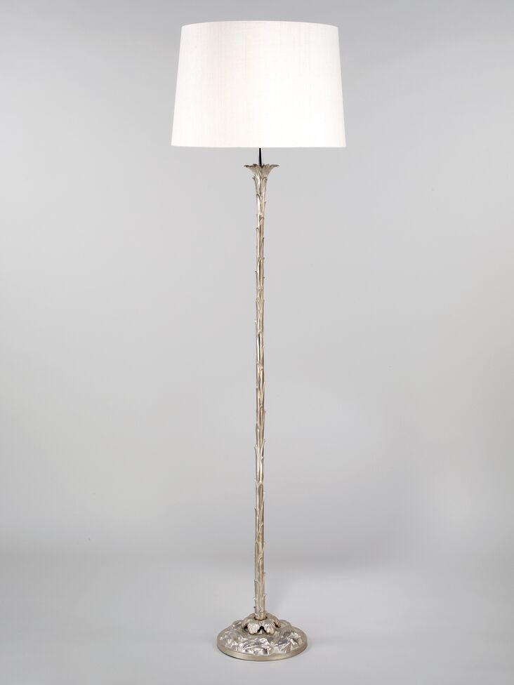 Front view of a classic floor lamp highlighting refined proportions and timeless architectural design.