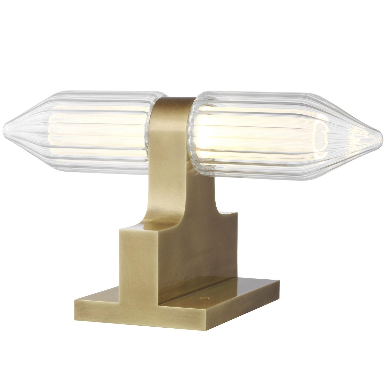 Art Deco table lamp photographed on a clean white background showcasing geometric forms, luxurious materials and elegant finishes.