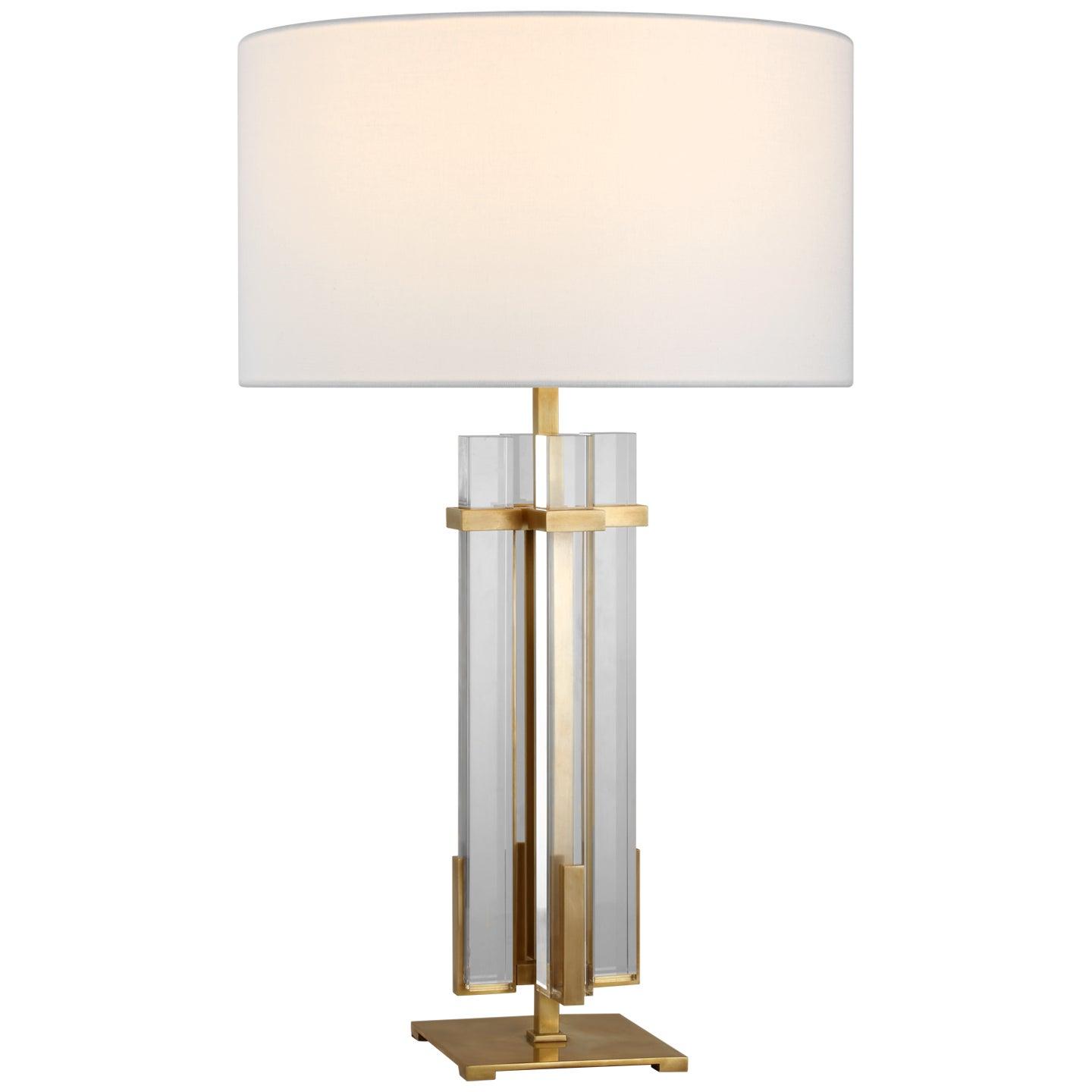 Art Deco table lamp photographed on a clean white background showcasing geometric forms, luxurious materials and elegant finishes.