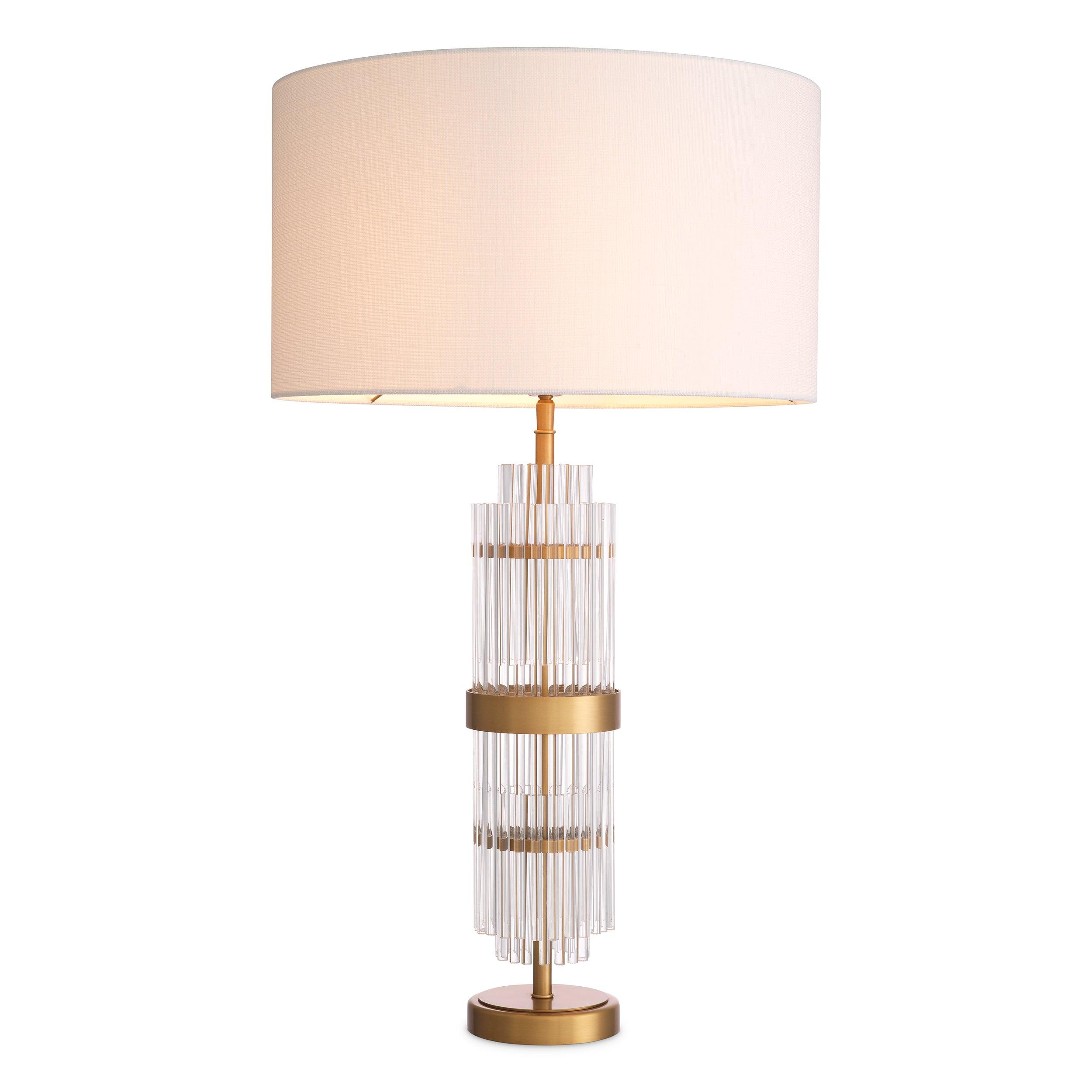 Art Deco table lamp photographed on a clean white background showcasing geometric forms, luxurious materials and elegant finishes.