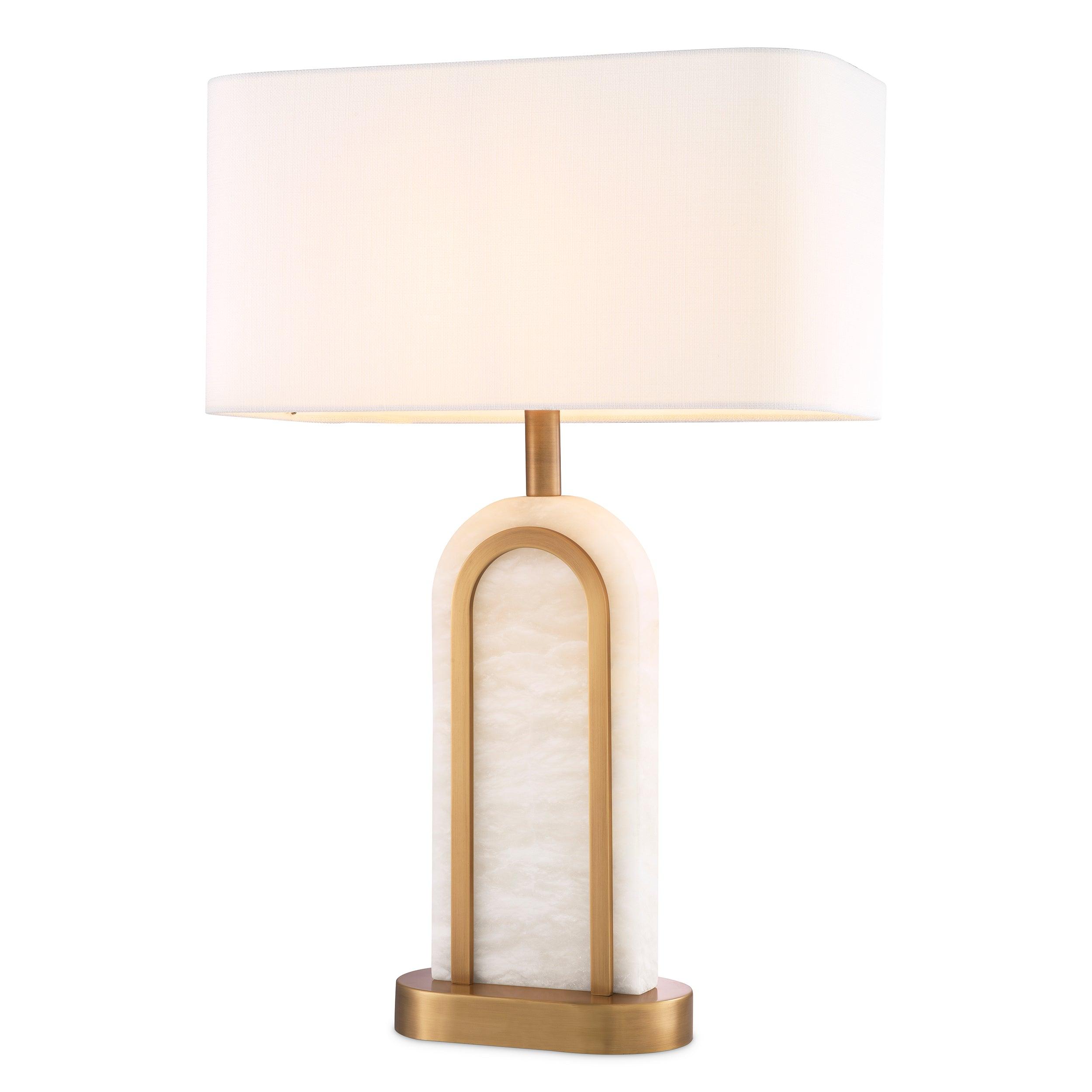 Art Deco table lamp photographed on a clean white background showcasing geometric forms, luxurious materials and elegant finishes.