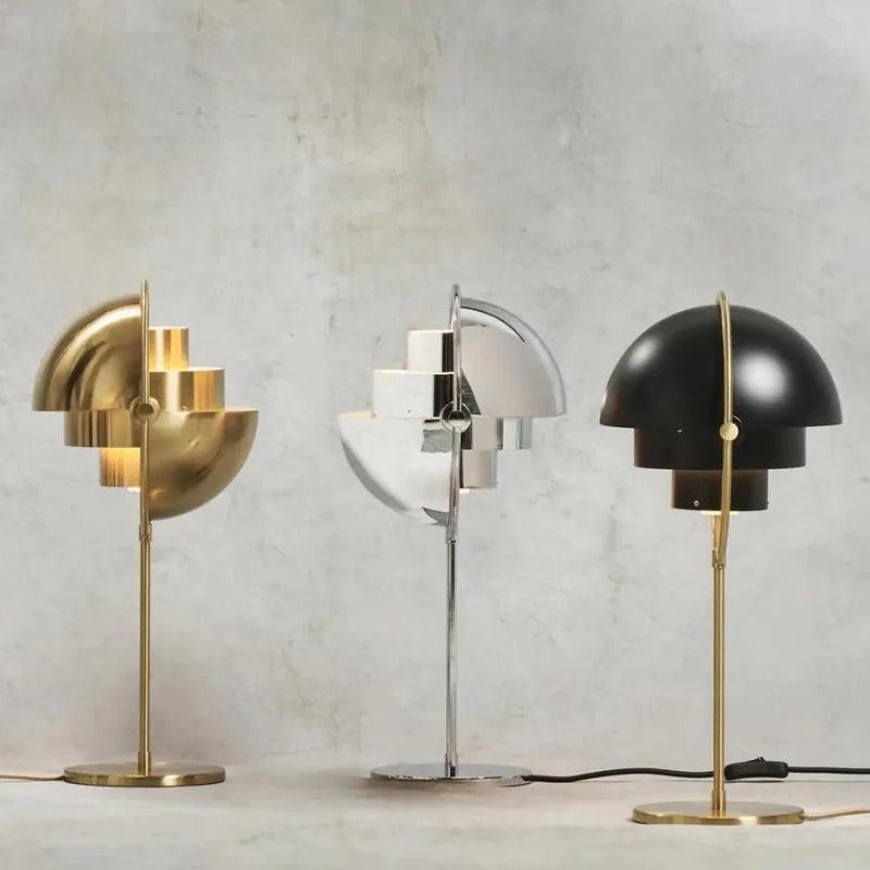 Collection of Art Deco table lamps featuring brass, marble and glass elements inspired by 1920s luxury design.