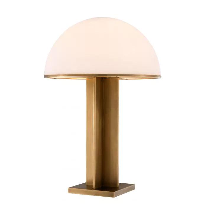 Art Deco table lamp photographed on a clean white background showcasing geometric forms, luxurious materials and elegant finishes.