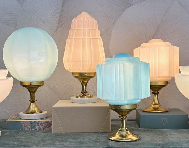 Collection of Art Deco table lamps featuring brass, marble and glass elements inspired by 1920s luxury design.