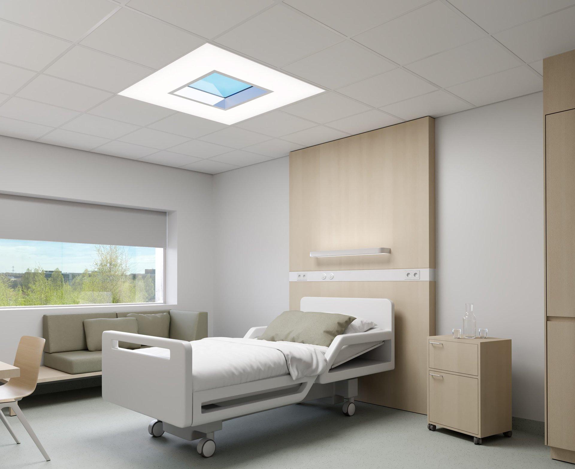 Recessed patient room lights installed in a contemporary healthcare environment.