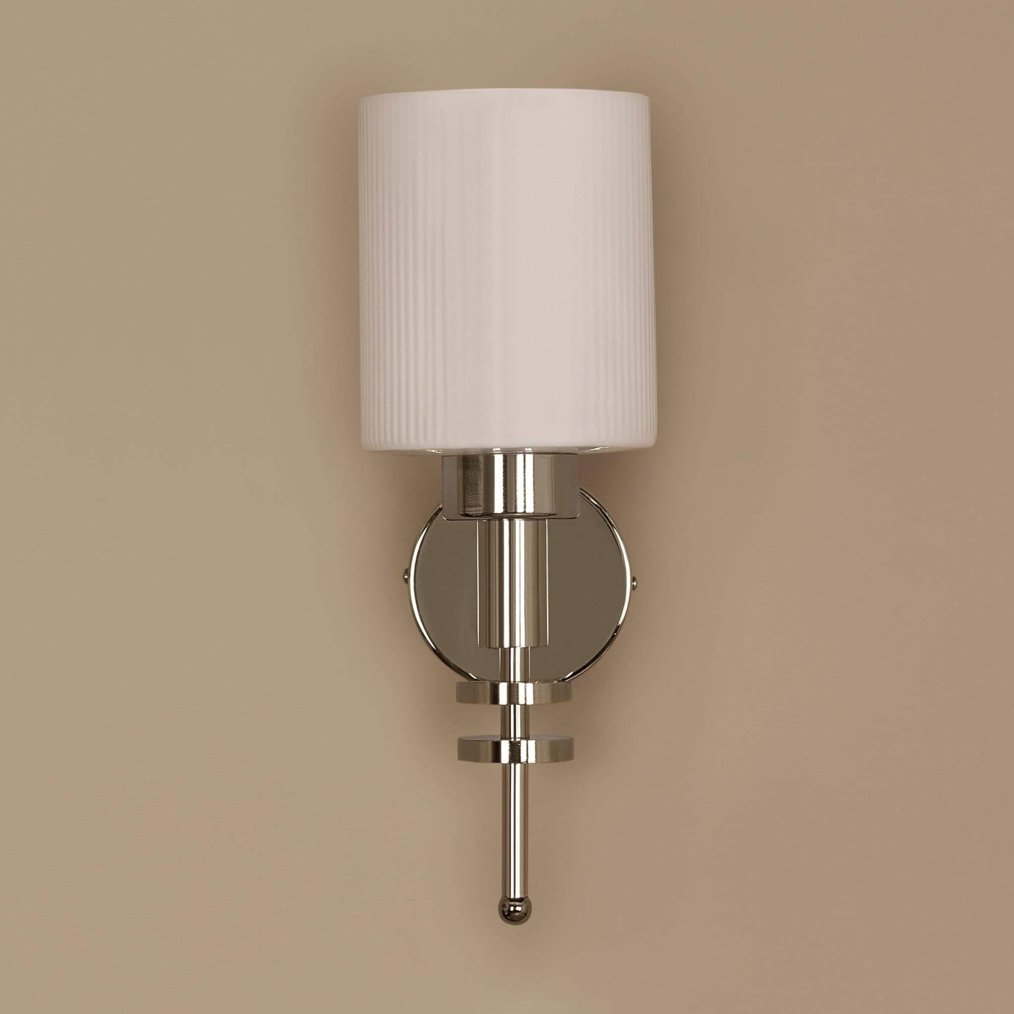 Front view of a transitional wall lamp combining contemporary and classic design.