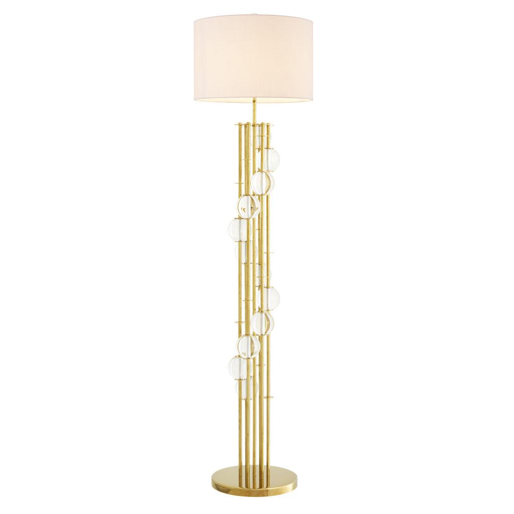 Art Deco floor lamp photographed on a clean white background showcasing geometric forms, luxurious materials and refined finishes.