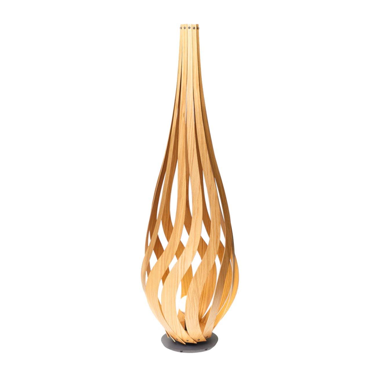 Organic floor lamp photographed on a clean white background showcasing flowing sculptural forms and premium natural materials.