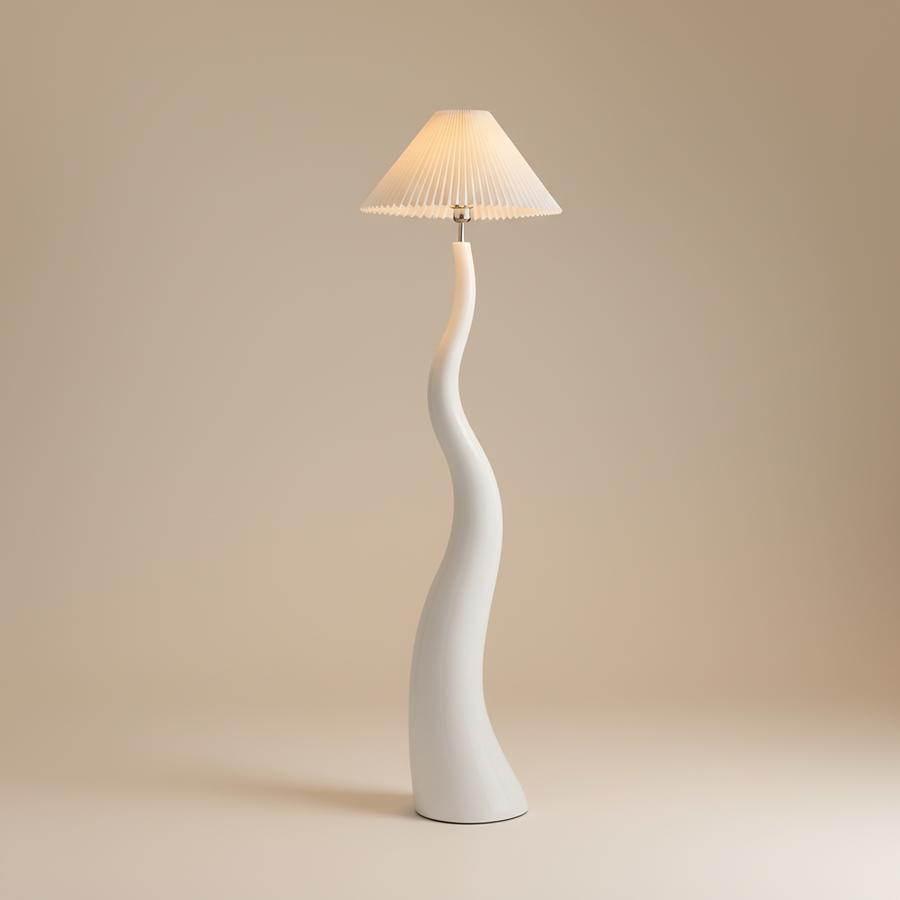 Front view of an organic floor lamp highlighting elegant curves, refined craftsmanship and contemporary design.