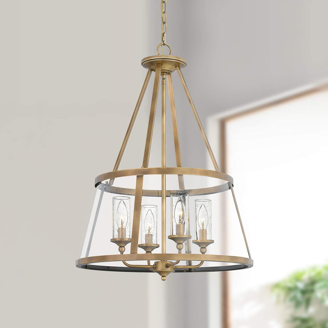 Cage chandelier installed in a contemporary hospitality interior with industrial architectural styling.