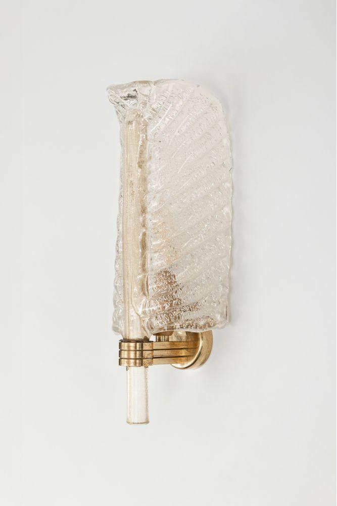 Front view of an elegant Murano wall lamp featuring artistic hand-blown glass.