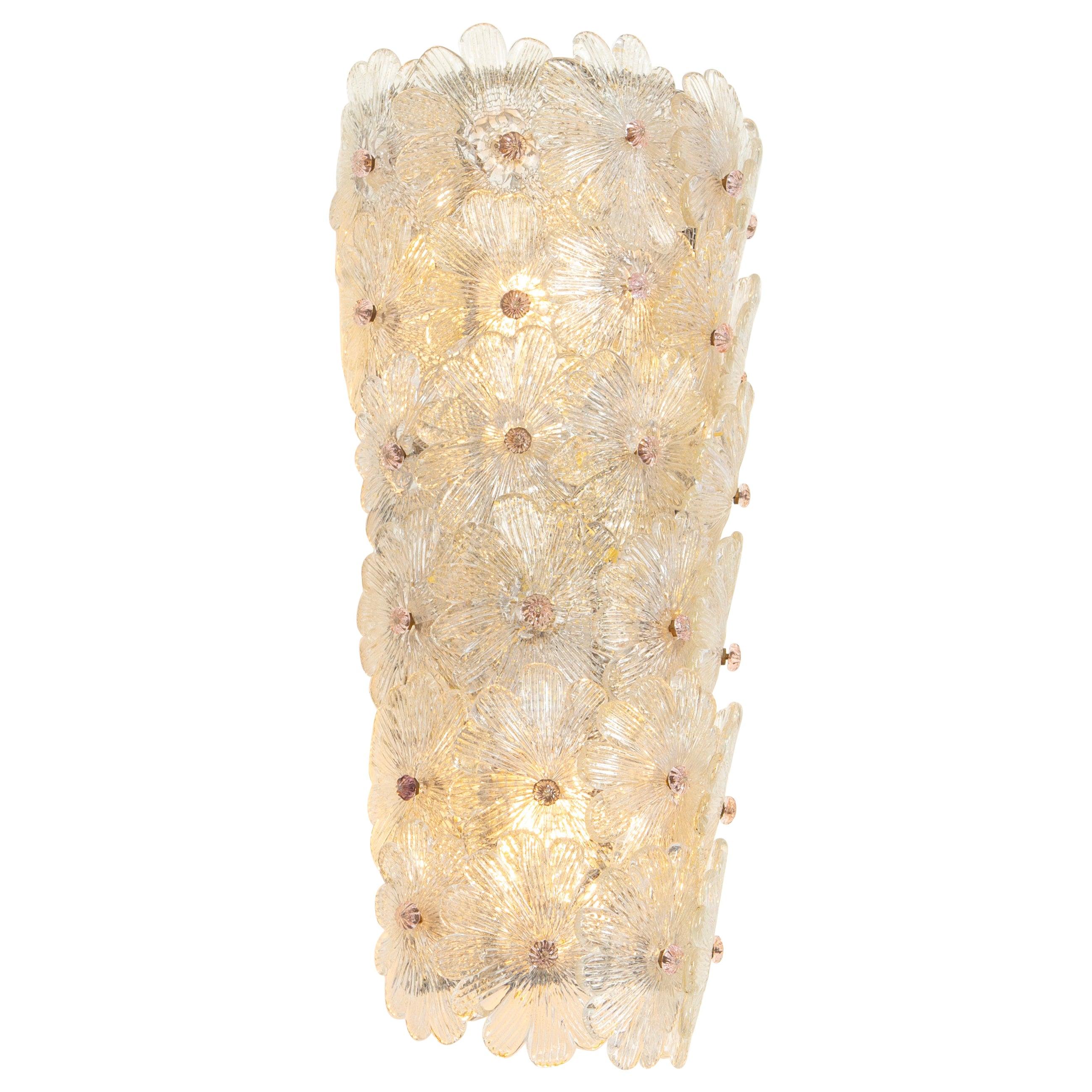 Handcrafted Murano glass wall lamp photographed on a clean white studio background.