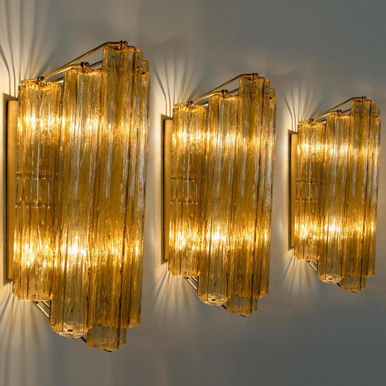 Murano wall lamp family showcasing classic Venetian and contemporary art glass designs.