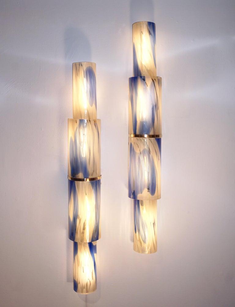 Murano wall lamp family showcasing classic Venetian and contemporary art glass designs.