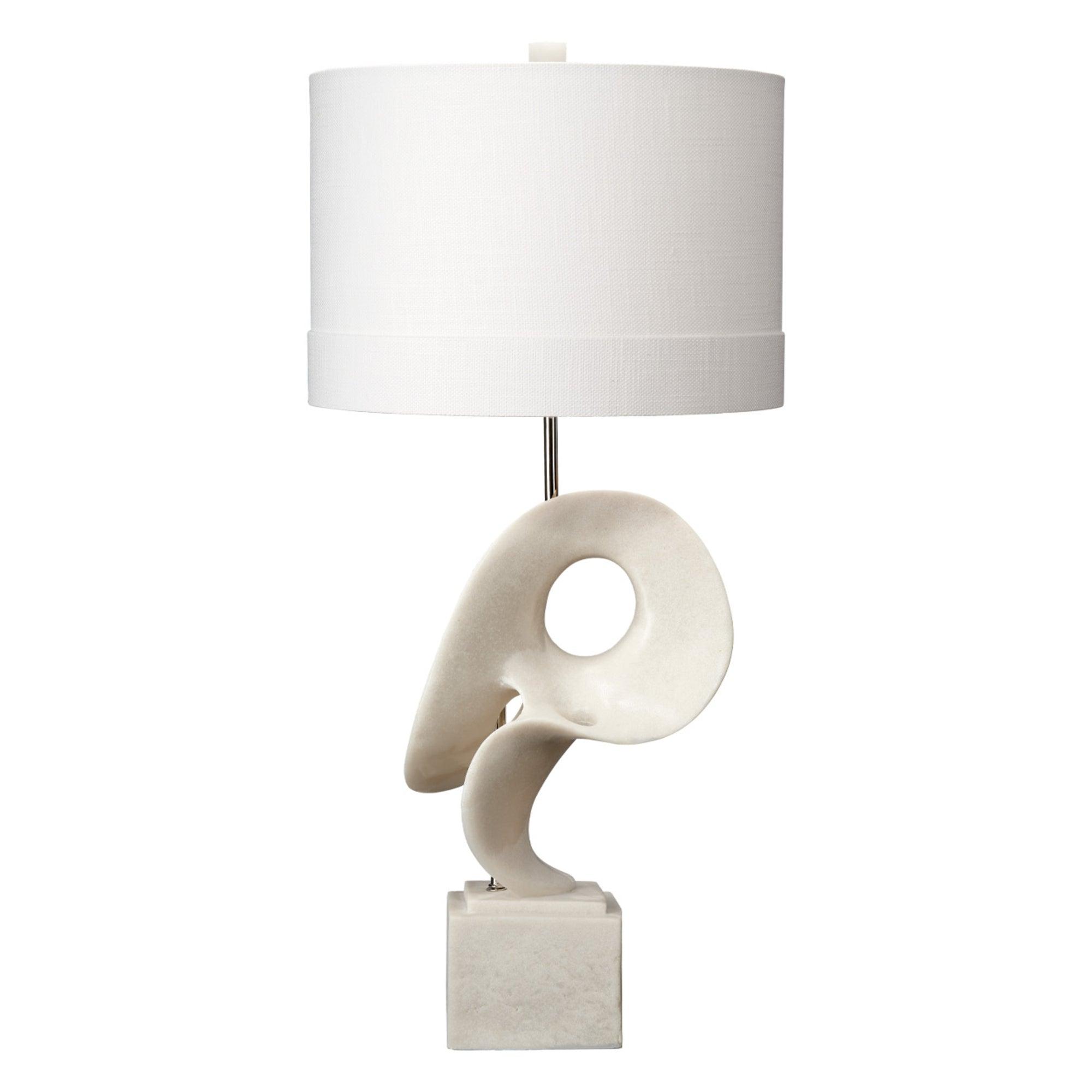 Sculptural table lamp photographed on a clean white background highlighting its artistic form and premium craftsmanship.